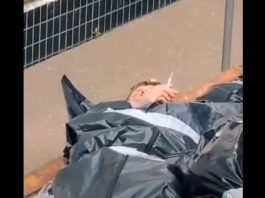 FAKE – Vídeo mostrando homem fumando dentro de saco preto não é “fraude da pandemia”