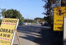 Rodovia do Arroz com placa de "Cuidado, obras a 50 M"